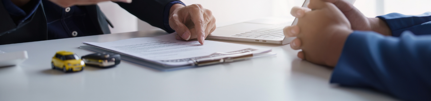 Two People Discussing Car Purchase Details